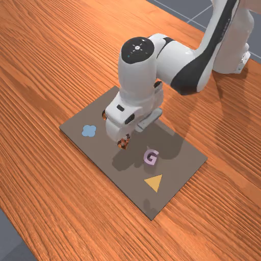 The robot must pick up one of the misplaced shapes on the board/kit and insert it into the correct empty slot.