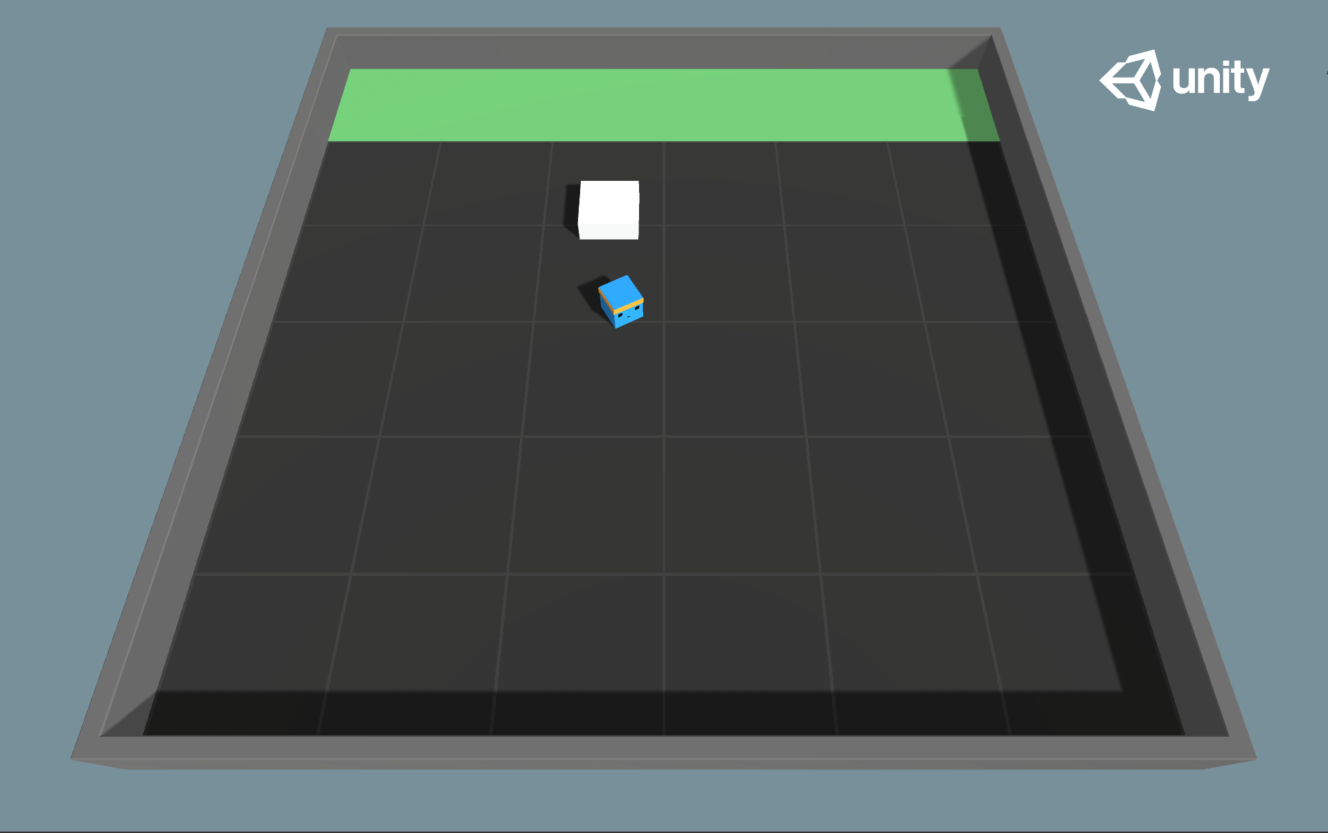 A platforming environment where the agent can push a block around. The agent must push the block to the goal